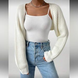 White Knit Cardigan and Blue Jeans